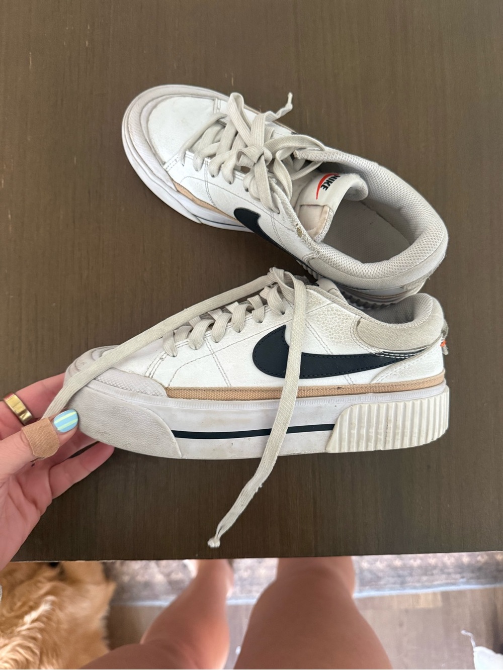 Nike Women’s Low-Top Sneakers in White with Black Swoosh and Tan Accent